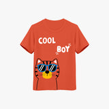 A red kids' t-shirt with a graphic print of a cat wearing sunglasses and the text 'COOL BOY'.