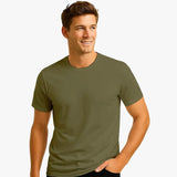 Man wearing a green t-shirt against a plain background