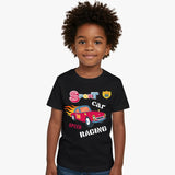 Child wearing a black t-shirt with colorful car graphics and text on a white background