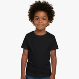 Child wearing a black t-shirt on a white background