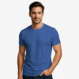 Man wearing a blue t-shirt against a plain background
