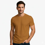 Man wearing a brown t-shirt against a white background