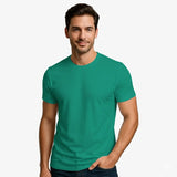 Man wearing a green t-shirt against a plain background